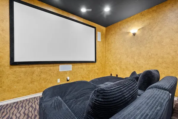 a bedroom with a bed and wall painting