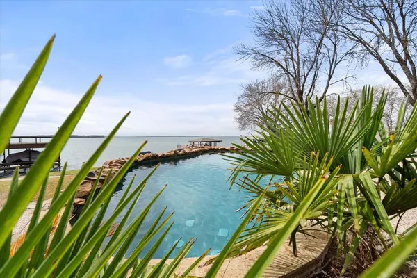 a view of a backyard of a house