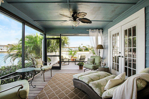 814 Ocean Dunes Circle Jupiter, FL 33477 - Photo 28 of 34 a living room with furniture and a large window
