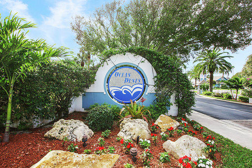 814 Ocean Dunes Circle Jupiter, FL 33477 - Photo 32 of 34 a view of a garden with a tree