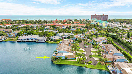 814 Ocean Dunes Circle Jupiter, FL 33477 - Photo 5 of 34 a view of a city with lawn chairs