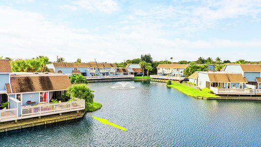 814 Ocean Dunes Circle Jupiter, FL 33477 - Photo 8 of 34 a view of a lake with a nearby beach