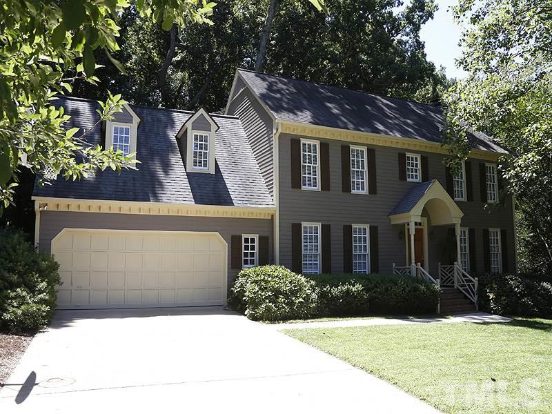 8904 Wellsley Way Raleigh, NC 27613 - Photo 3 of 25 a front view of a house with yard
