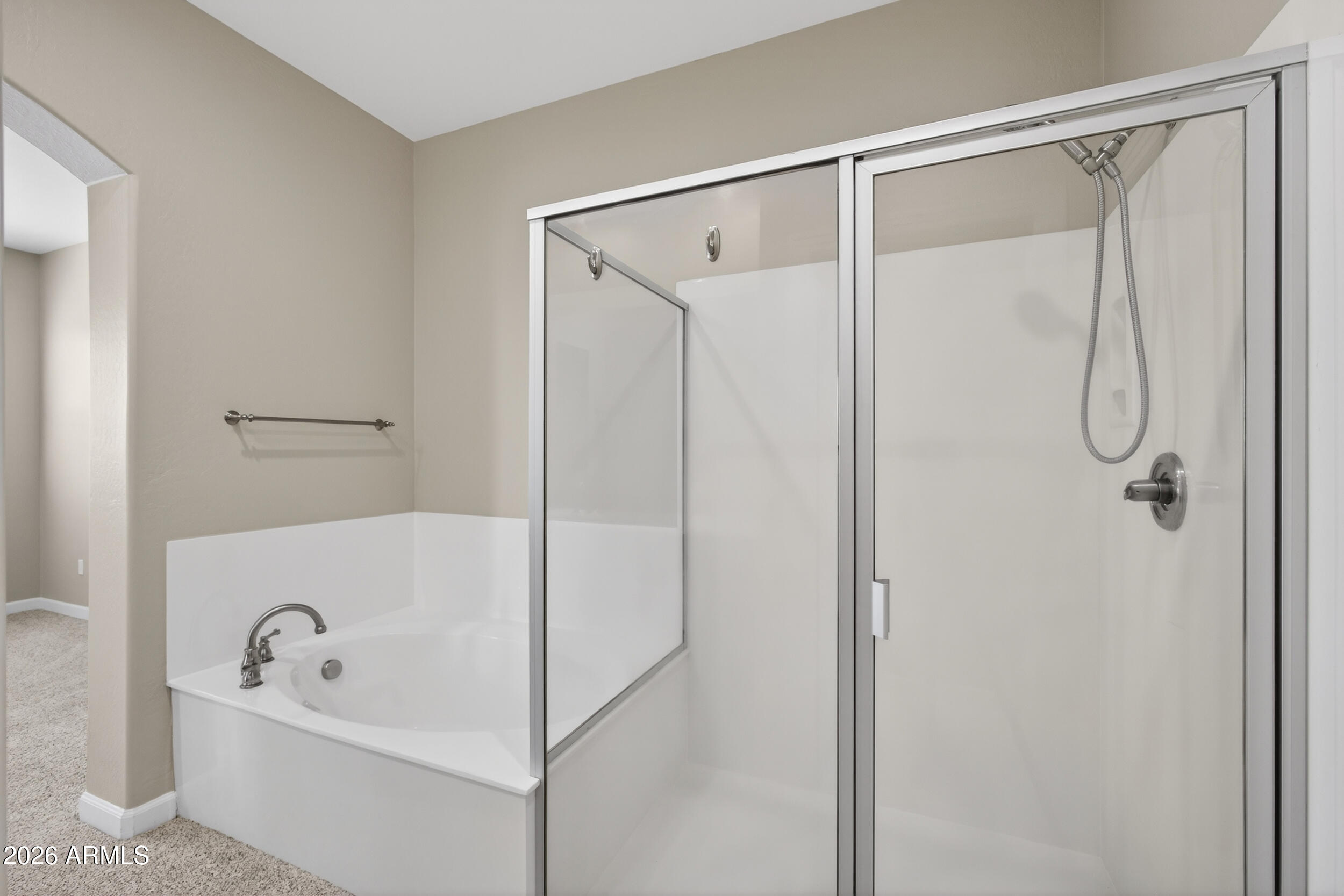 4777 South Fulton Ranch Boulevard, Unit 2044 Chandler, AZ 85248 - Photo 21 of 46 a bathroom with a tub a sink and shower