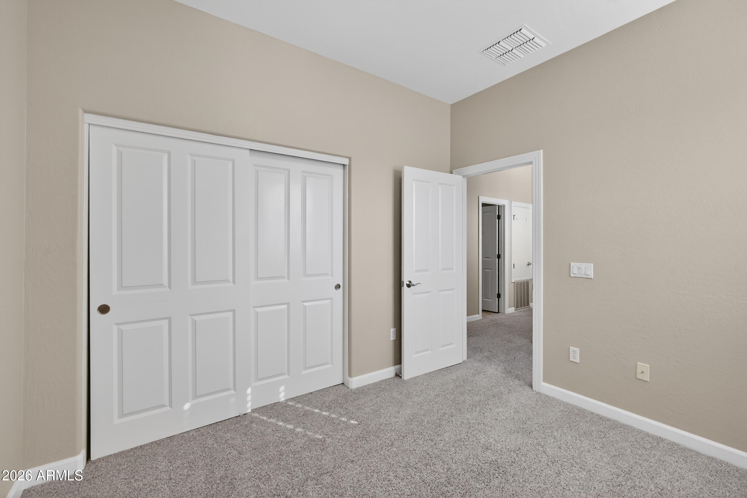 4777 South Fulton Ranch Boulevard, Unit 2044 Chandler, AZ 85248 - Photo 22 of 46 an empty room with closet area