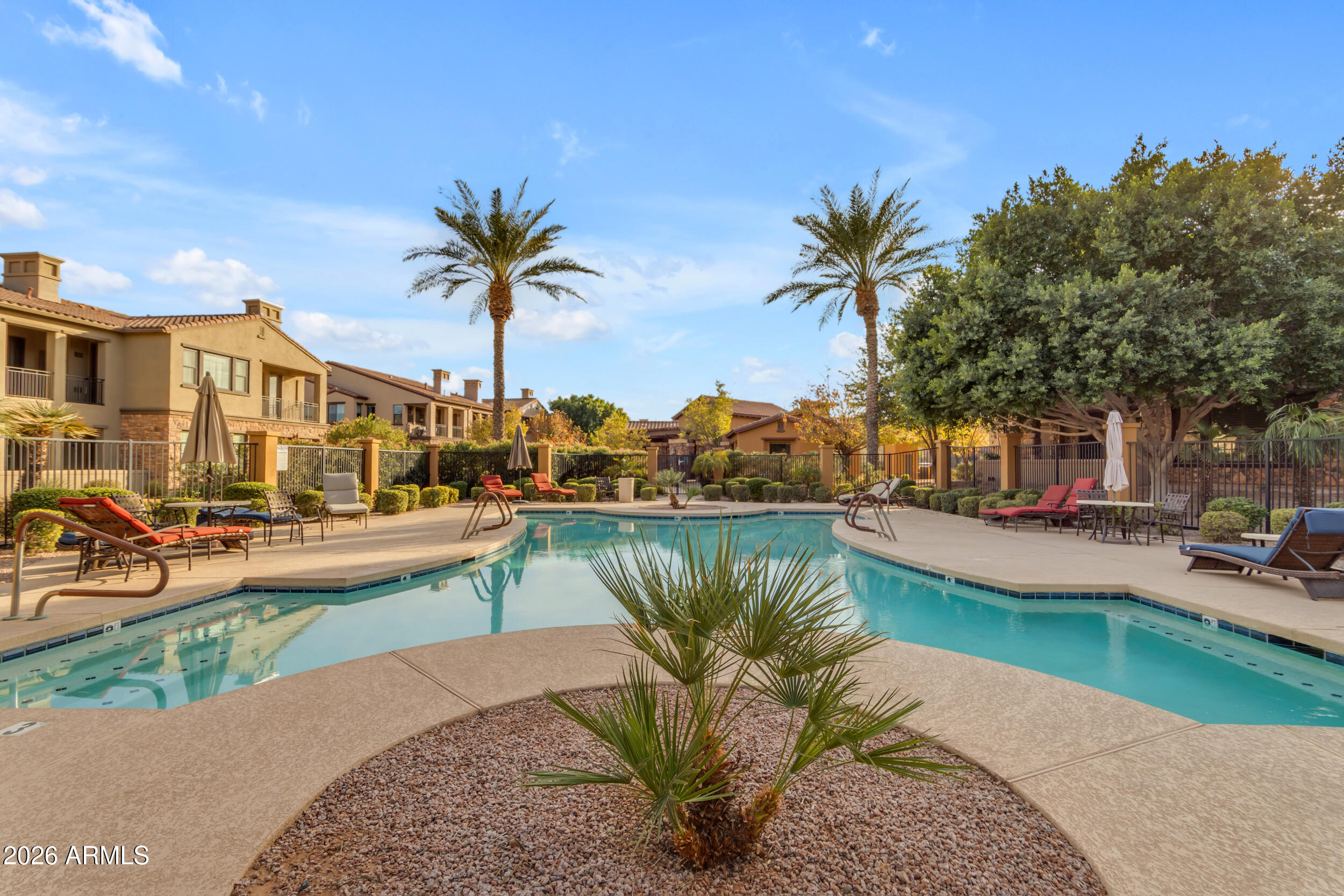 4777 South Fulton Ranch Boulevard, Unit 2044 Chandler, AZ 85248 - Photo 39 of 46 a view of a lake with couches and city view