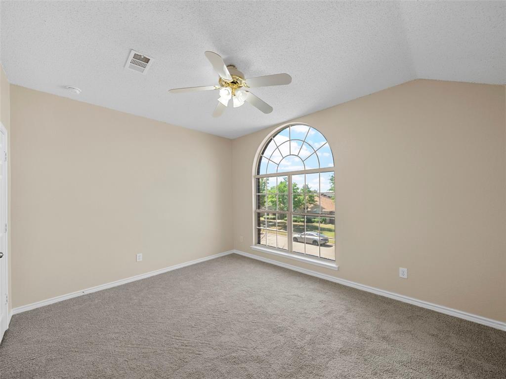 741 Aspen Court Allen, TX 75002 - Photo 34 of 40 Front upstairs bedroom, fresh paint, carpet with ceiling fan and baseboards
