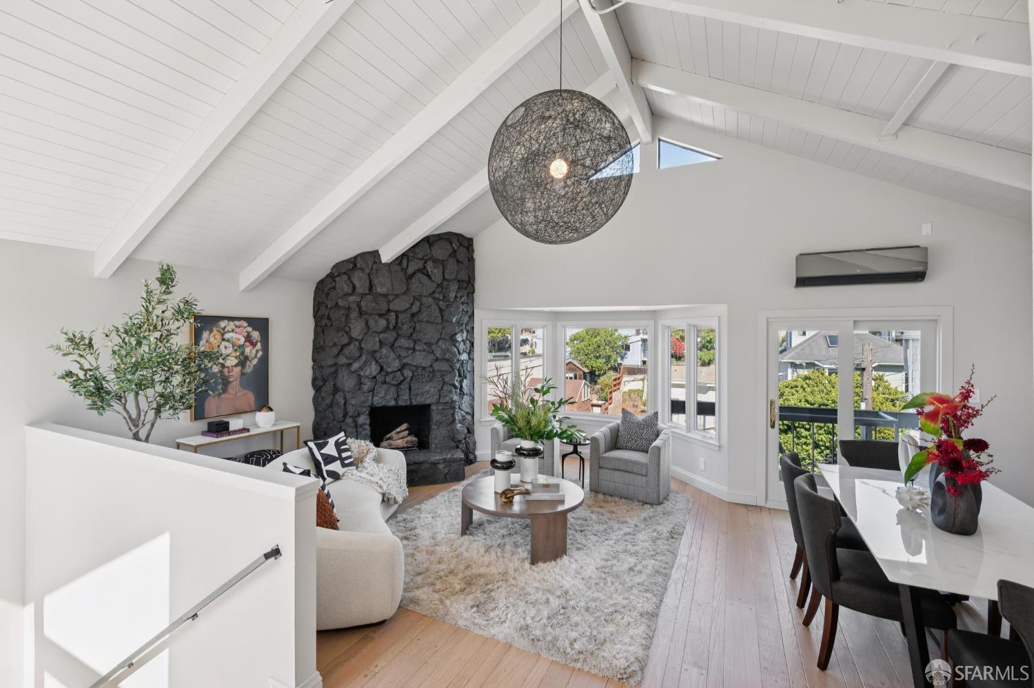 2023 22nd Street San Francisco, CA 94107 - Photo 1 of 56 a living room with furniture a fireplace and a chandelier
