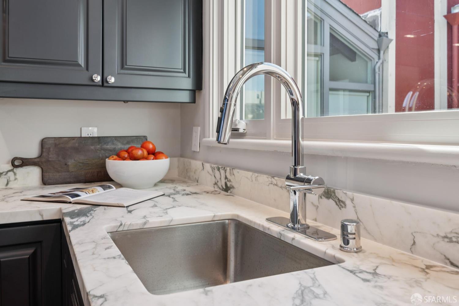2023 22nd Street San Francisco, CA 94107 - Photo 18 of 56 a kitchen with a sink and a stove top oven