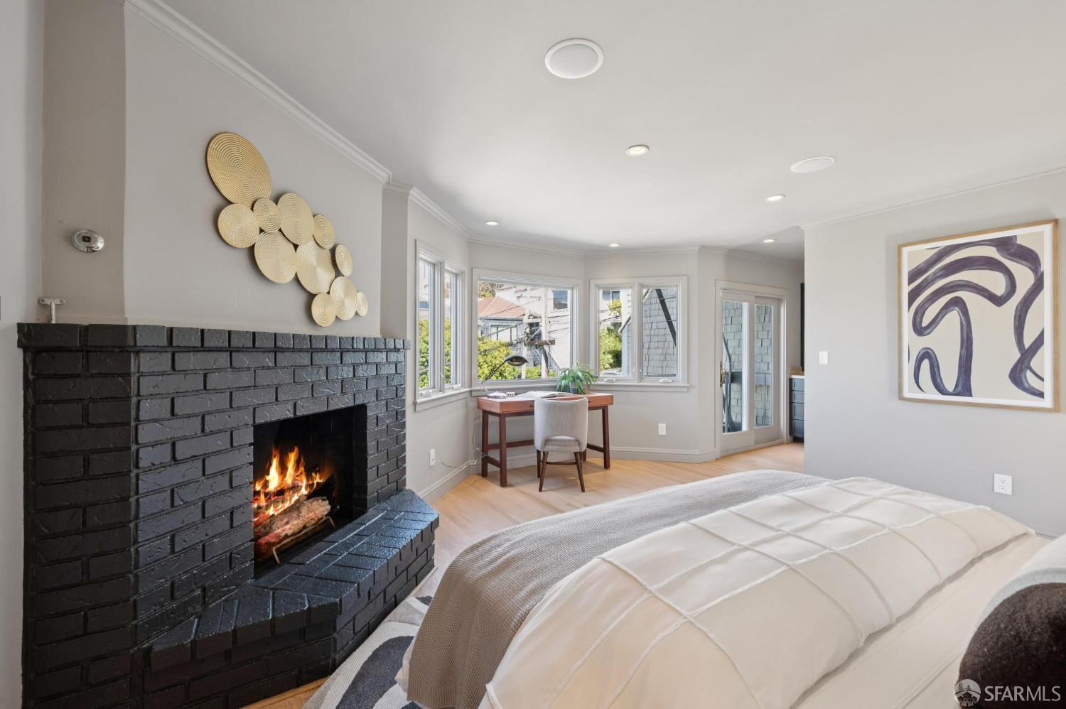 2023 22nd Street San Francisco, CA 94107 - Photo 25 of 56 a bedroom with a bed and a fireplace