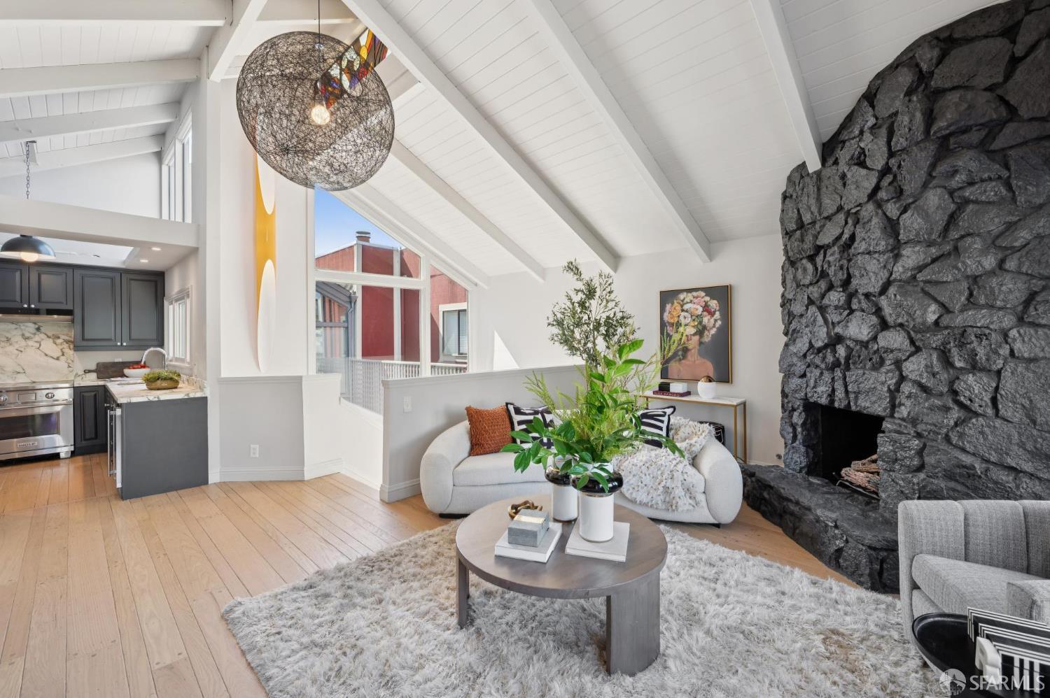 2023 22nd Street San Francisco, CA 94107 - Photo 3 of 56 a living room with furniture and a fireplace