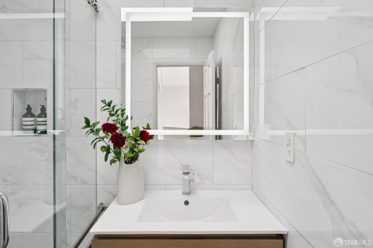 2023 22nd Street San Francisco, CA 94107 - Photo 31 of 56 a bathroom with a sink a toilet and a mirror
