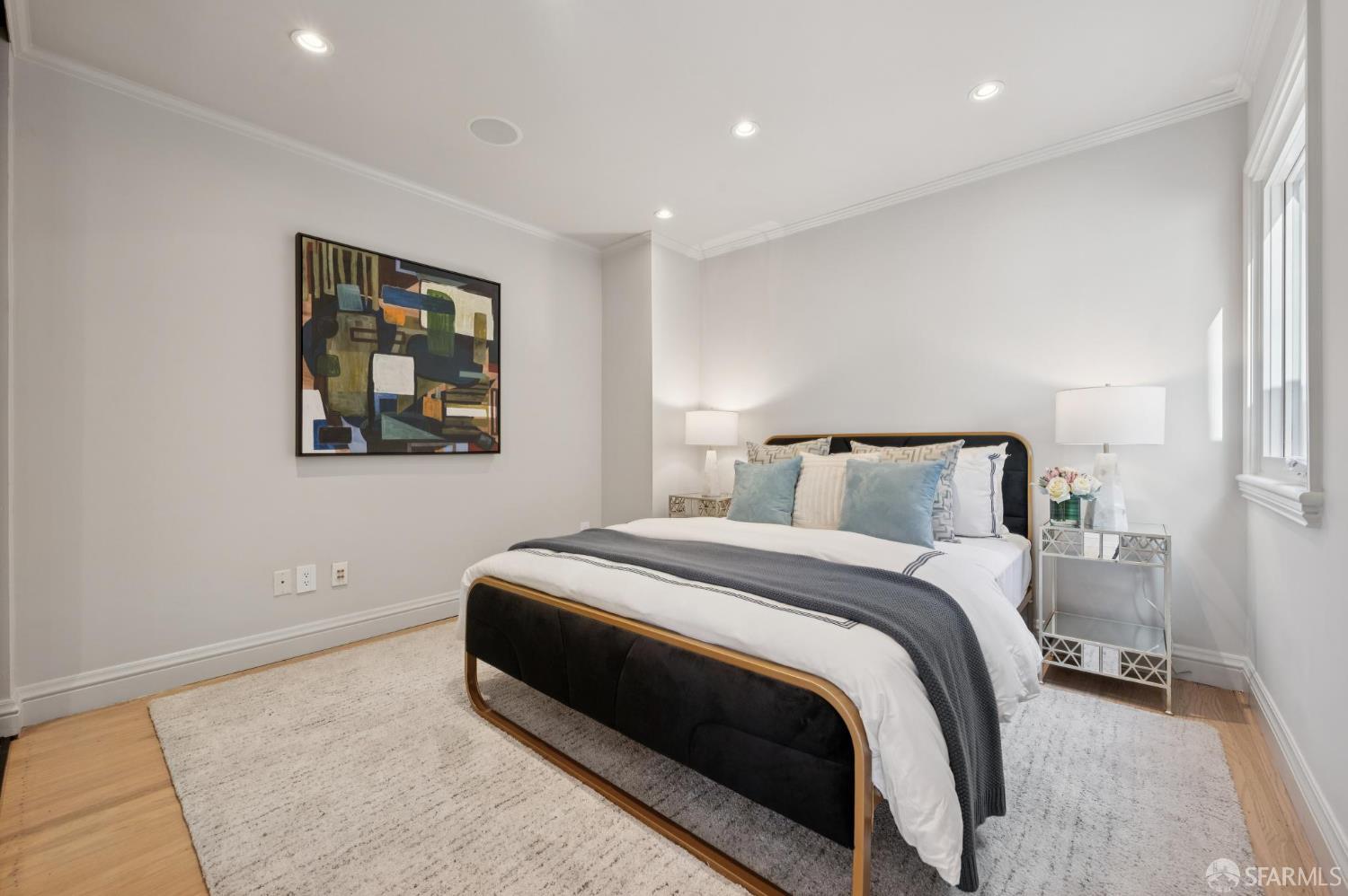 2023 22nd Street San Francisco, CA 94107 - Photo 33 of 56 a bedroom with bed and painting on the wall