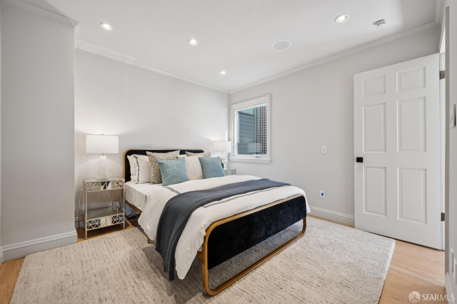 2023 22nd Street San Francisco, CA 94107 - Photo 34 of 56 a bed room with a bed and a night stand