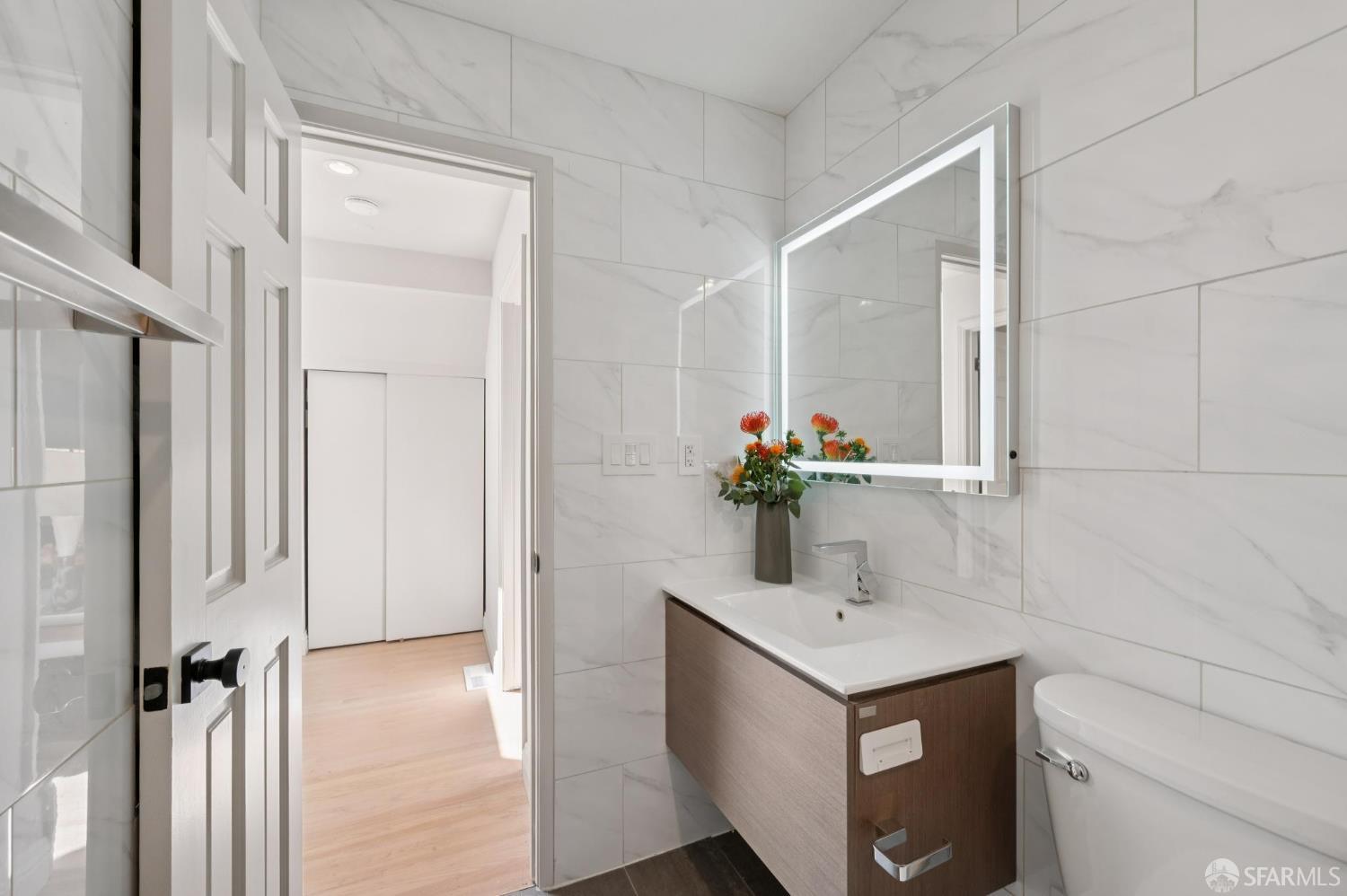 2023 22nd Street San Francisco, CA 94107 - Photo 37 of 56 a bathroom with a sink and a mirror