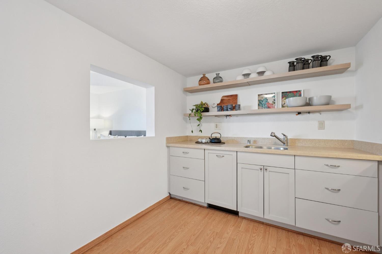 2023 22nd Street San Francisco, CA 94107 - Photo 47 of 56 a room with white cabinets and sink
