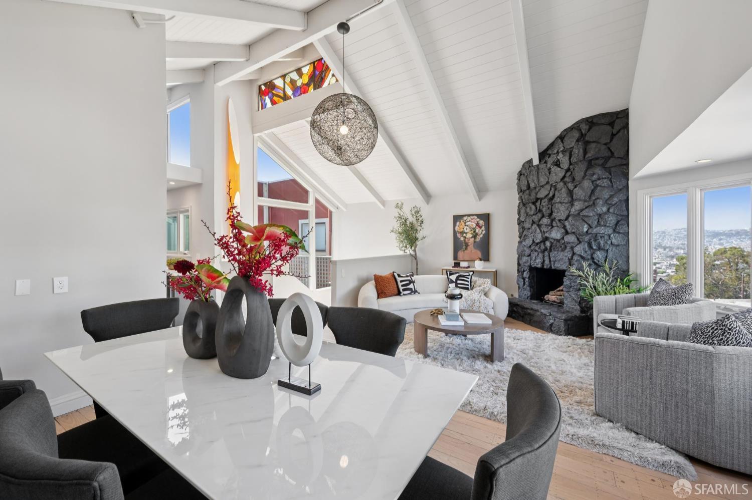 2023 22nd Street San Francisco, CA 94107 - Photo 10 of 56 a living room with furniture a chandelier and a table