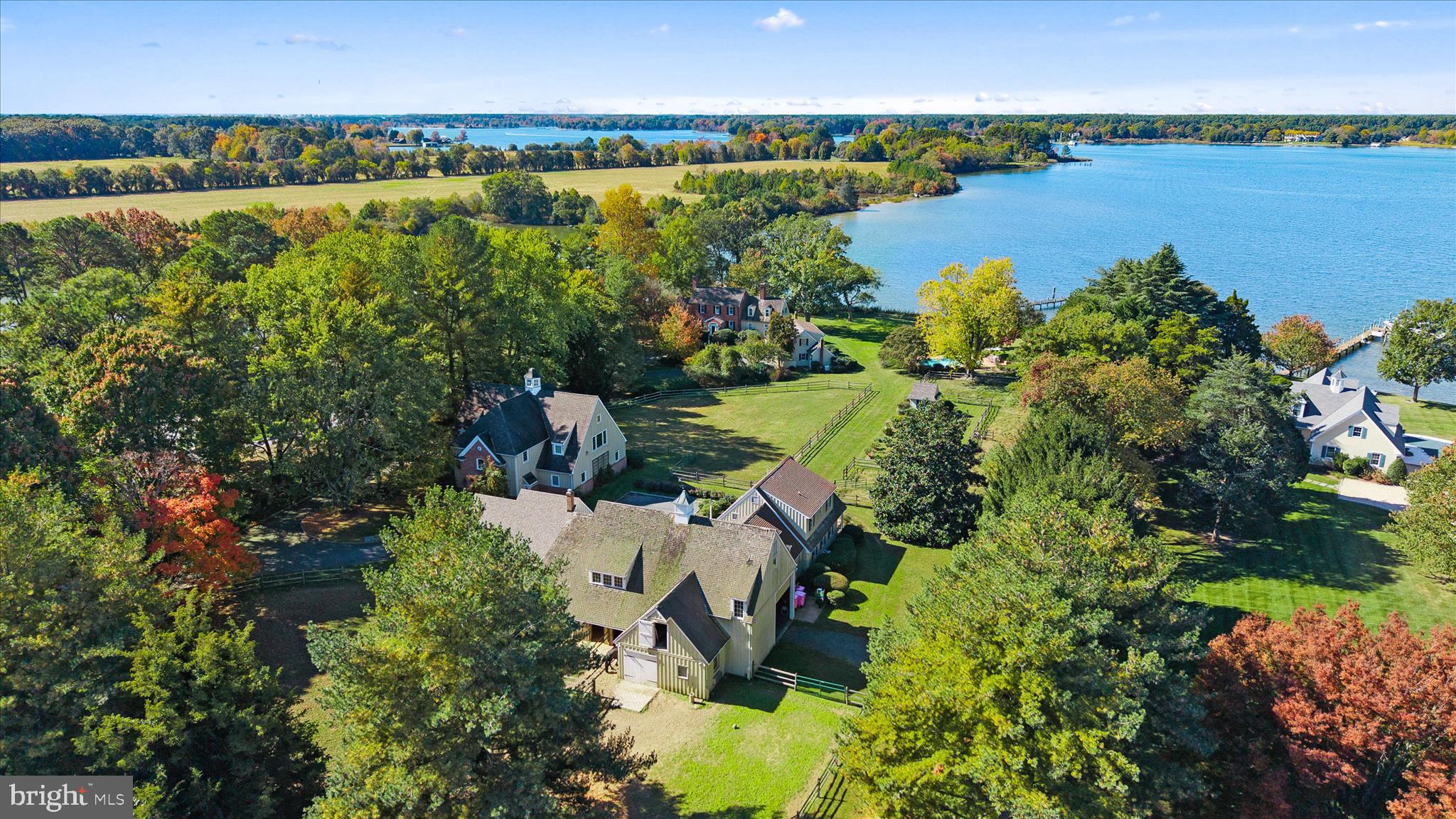 27473 Westpoint Road Easton, MD 21601 - Photo 1 of 58 an aerial view of a houses with a lake view
