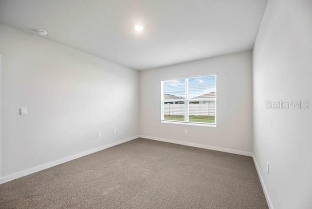 3703 Hatchery Way Lakewood Ranch, FL 34211 - Photo 25 of 35 an empty room with a window