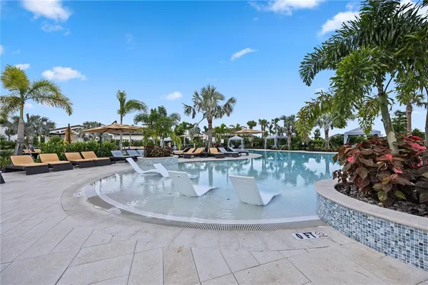 a view of a water fountain and a fountain in the background