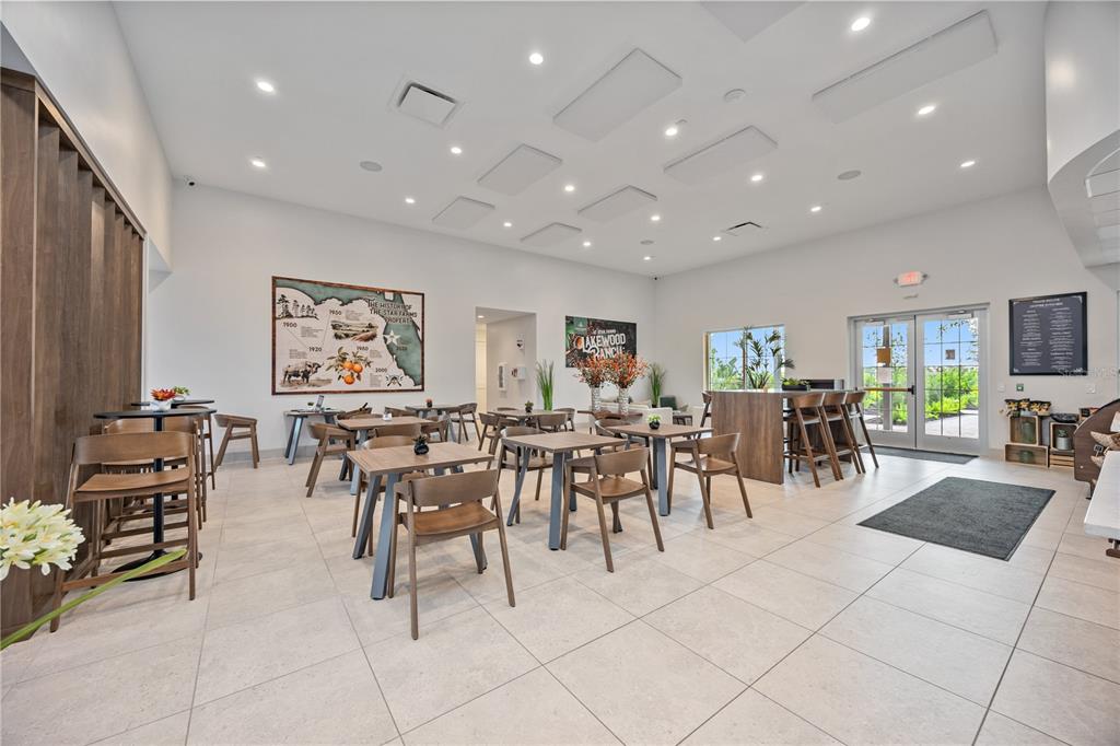 3703 Hatchery Way Lakewood Ranch, FL 34211 - Photo 33 of 35 a view of a dining area with furniture