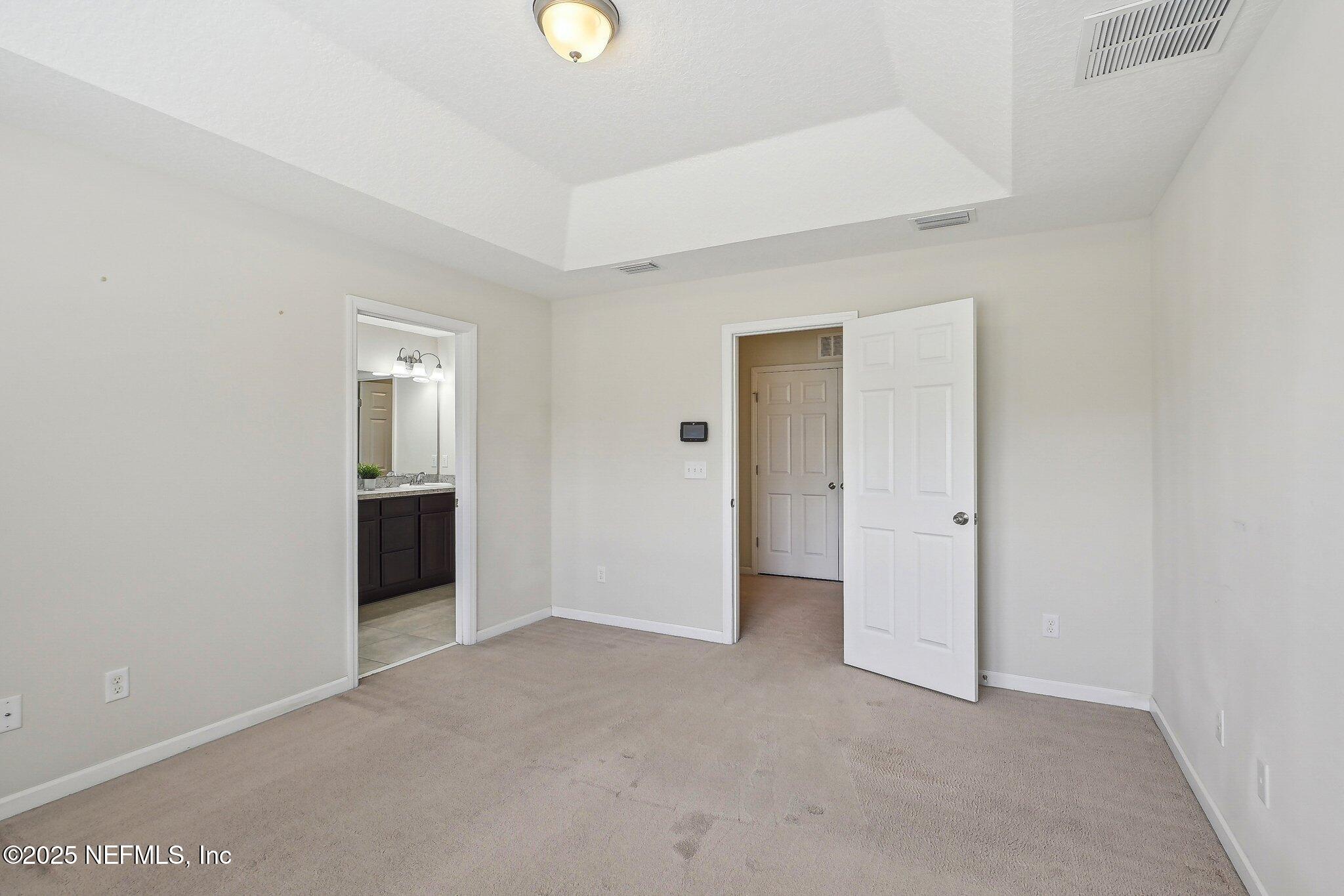 53 Nelson Lane St. Johns, FL 32259 - Photo 21 of 37 an empty room with windows