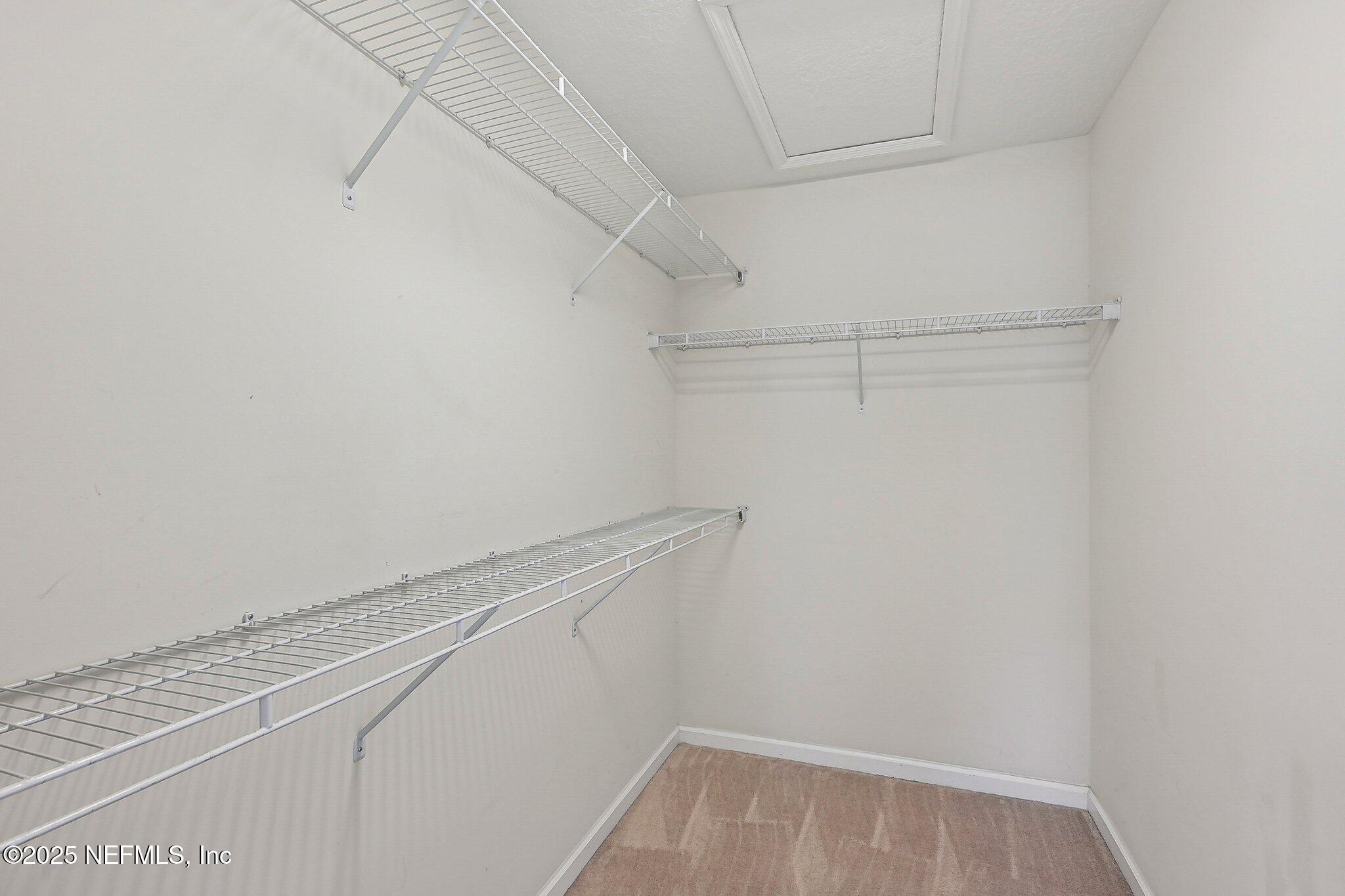 53 Nelson Lane St. Johns, FL 32259 - Photo 25 of 37 a view of a room with racks on the wall
