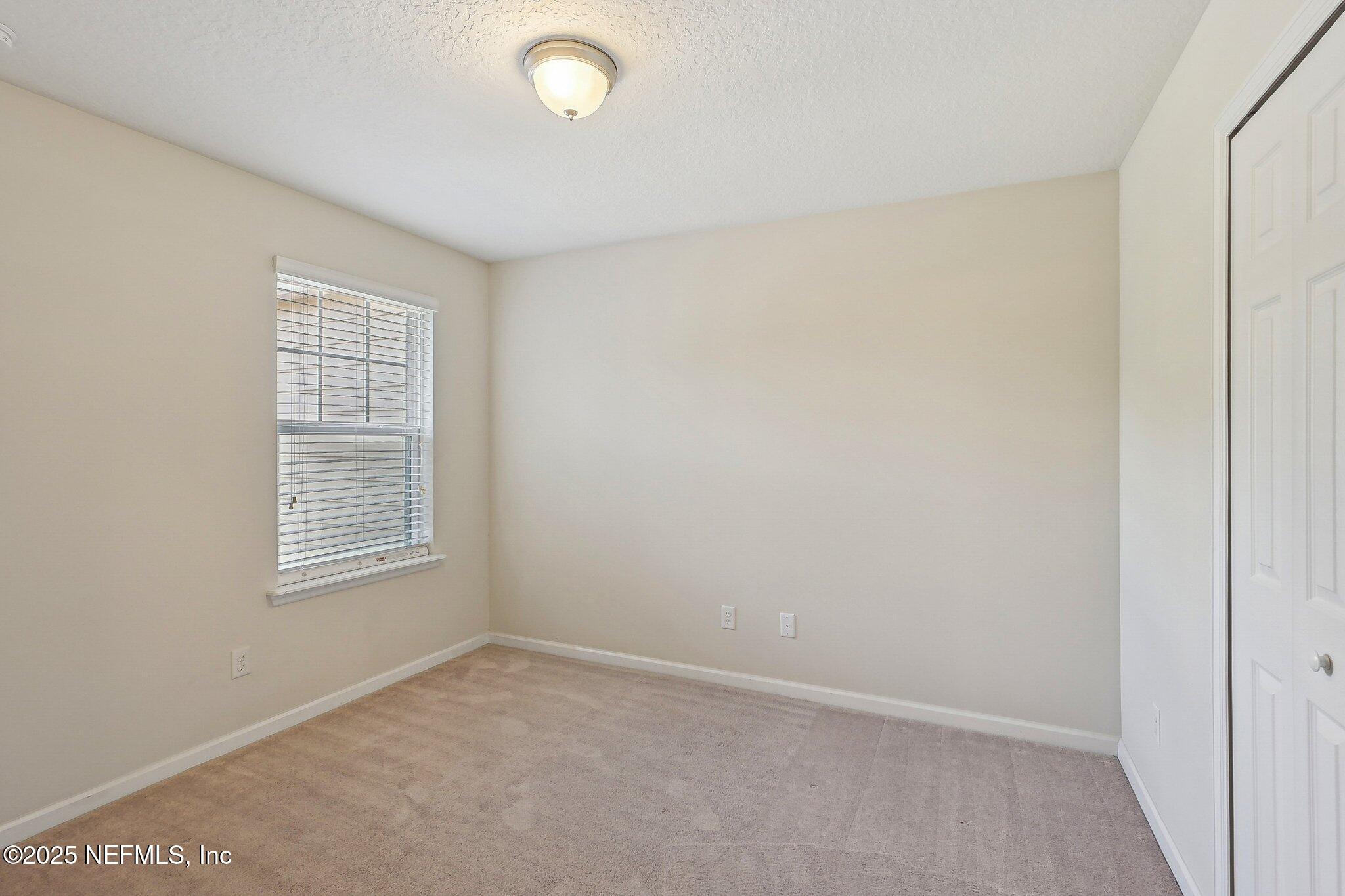53 Nelson Lane St. Johns, FL 32259 - Photo 29 of 37 an empty room with windows