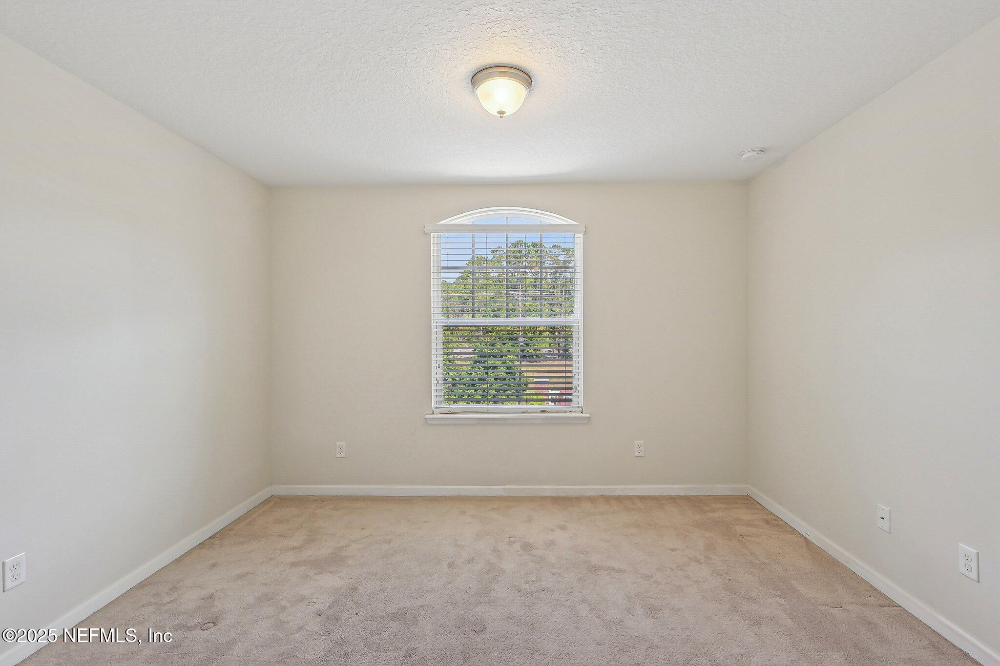 53 Nelson Lane St. Johns, FL 32259 - Photo 30 of 37 an empty room with a window