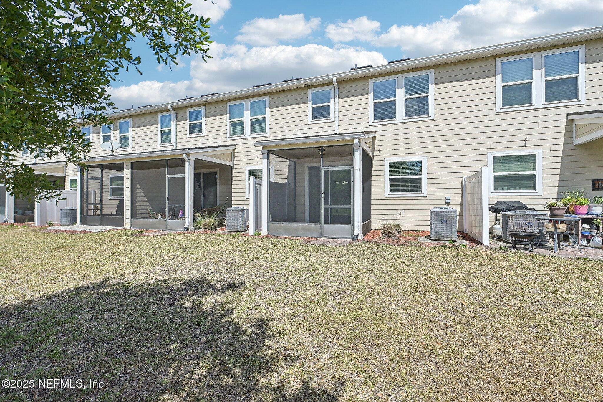 53 Nelson Lane St. Johns, FL 32259 - Photo 35 of 37 a front view of a house with a garden