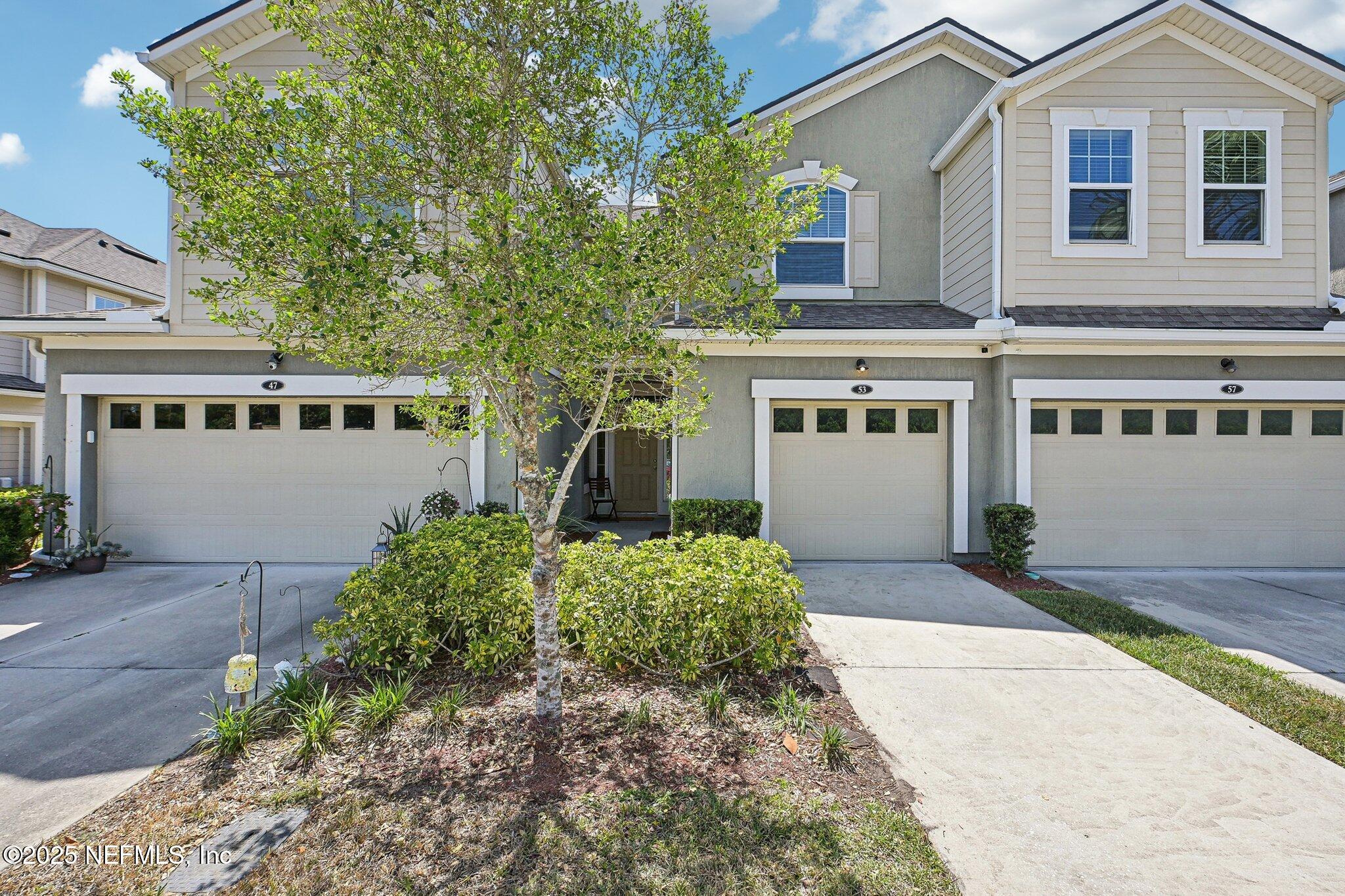 53 Nelson Lane St. Johns, FL 32259 - Photo 8 of 37 front view of a house with a yard