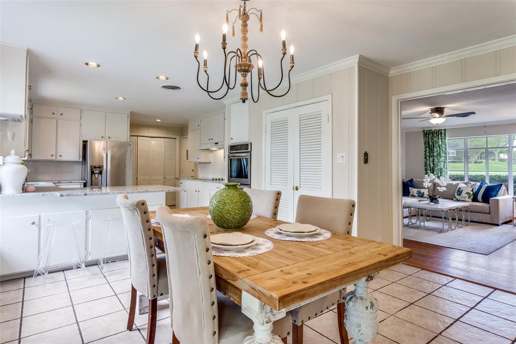 6491 Kirkwood Road Fort Worth, TX 76116 - Photo 11 of 25 a view of a dining room with furniture
