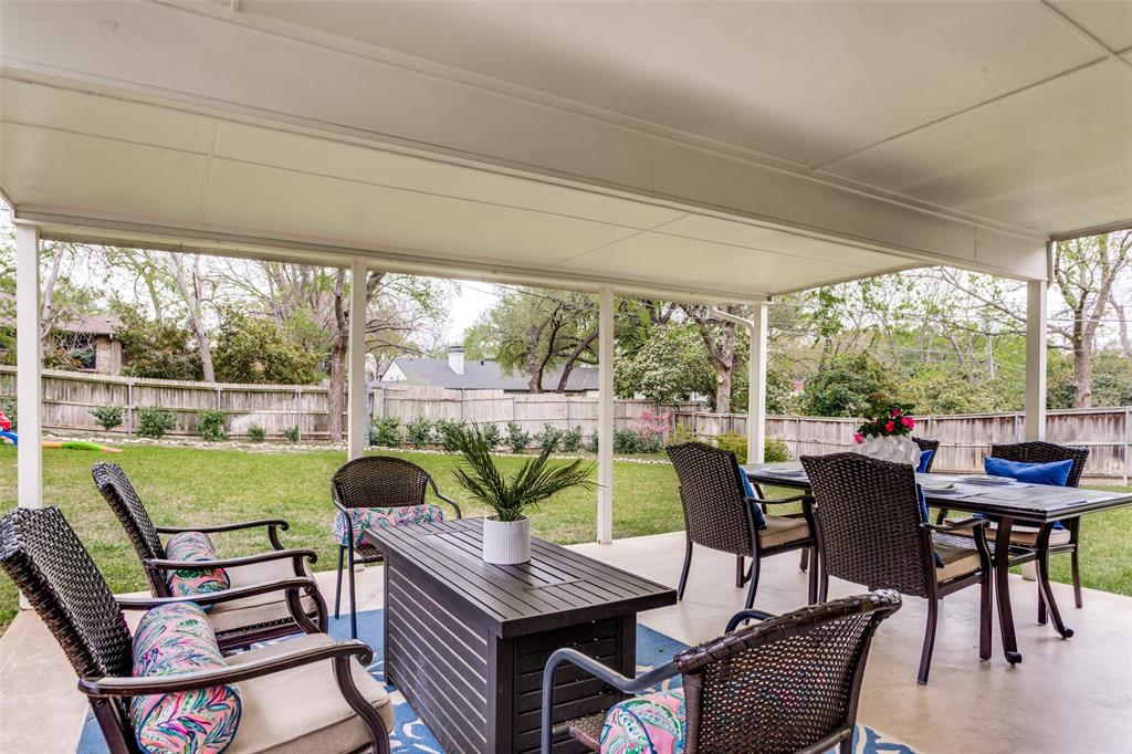 6491 Kirkwood Road Fort Worth, TX 76116 - Photo 22 of 25 a view of a dining room with furniture window and outside view