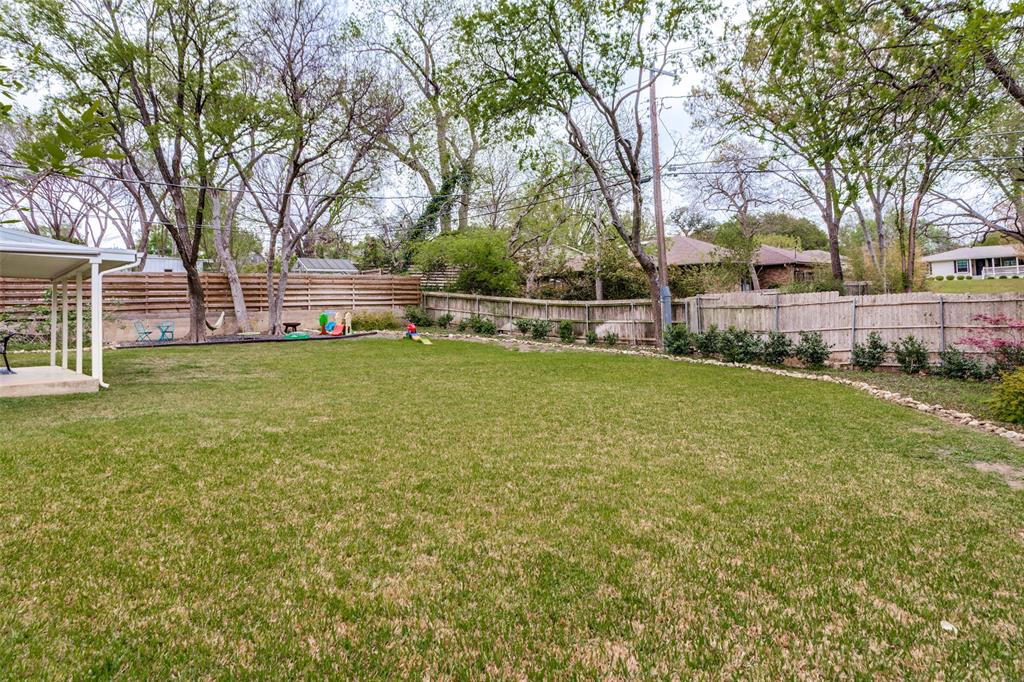 6491 Kirkwood Road Fort Worth, TX 76116 - Photo 24 of 25 a view of a yard with a large trees