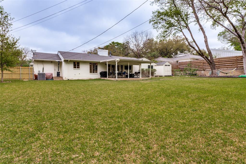 6491 Kirkwood Road Fort Worth, TX 76116 - Photo 25 of 25 a front view of a house with a garden
