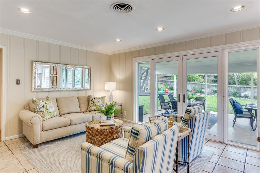 6491 Kirkwood Road Fort Worth, TX 76116 - Photo 9 of 25 a living room with furniture and large windows