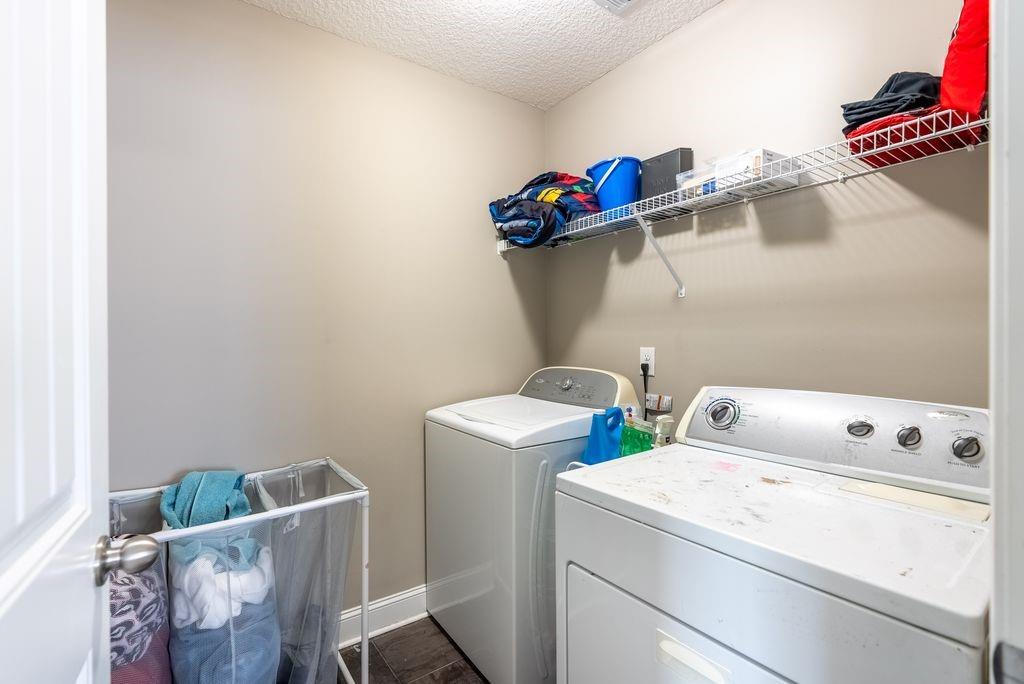 1200 Cypress Fall Circle Hinesville, GA 31313 - Photo 21 of 24 a utility room with dryer and washer