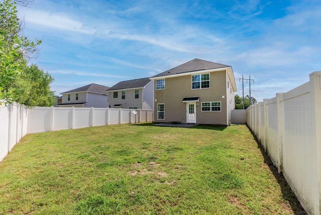 1200 Cypress Fall Circle Hinesville, GA 31313 - Photo 24 of 24 a house view with a outdoor space