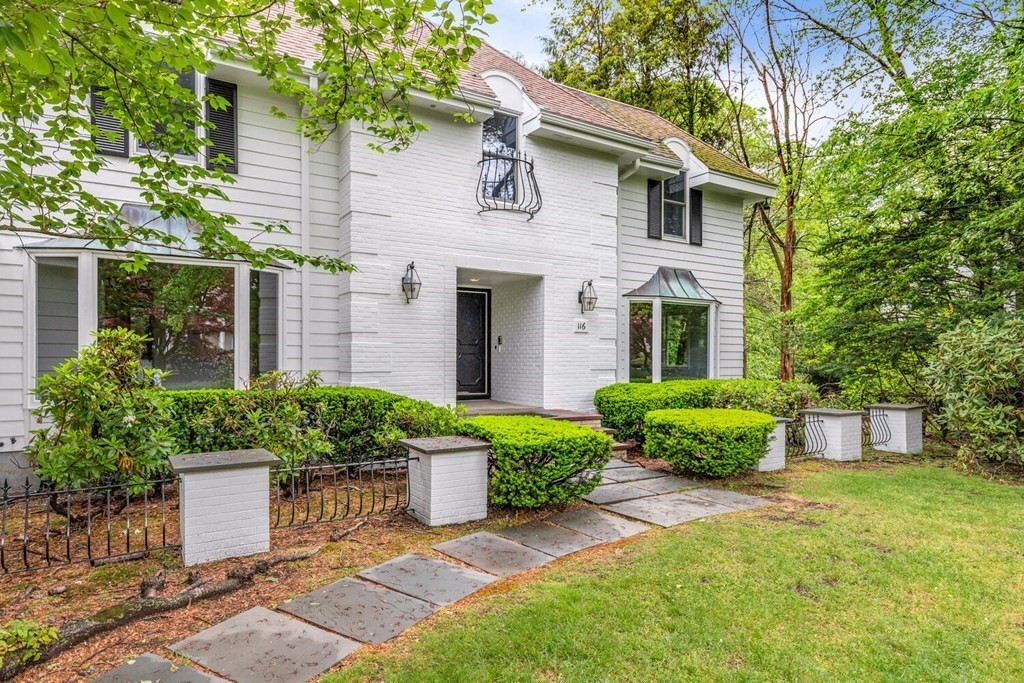 116 Kendall Road Lexington, MA 02421 - Photo 1 of 28 a front view of a house with a yard and potted plants