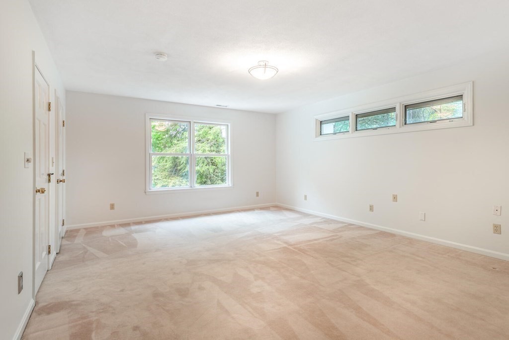116 Kendall Road Lexington, MA 02421 - Photo 18 of 28 an empty room with windows