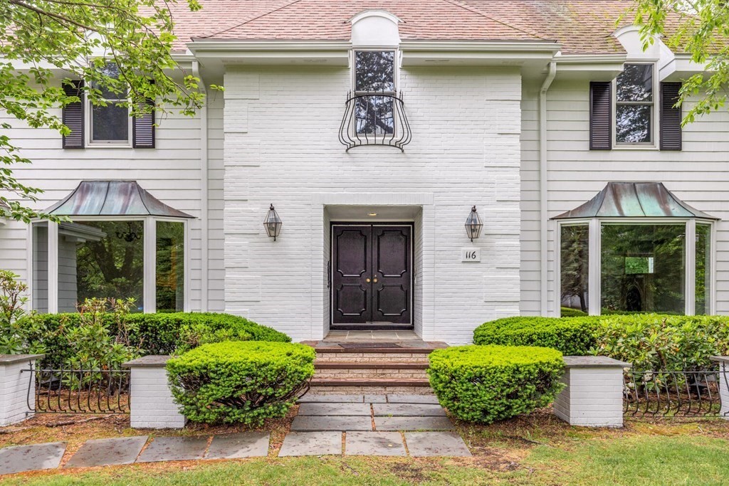 116 Kendall Road Lexington, MA 02421 - Photo 2 of 28 front view of a house with potted plants