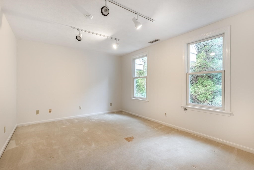 116 Kendall Road Lexington, MA 02421 - Photo 22 of 28 an empty room with windows