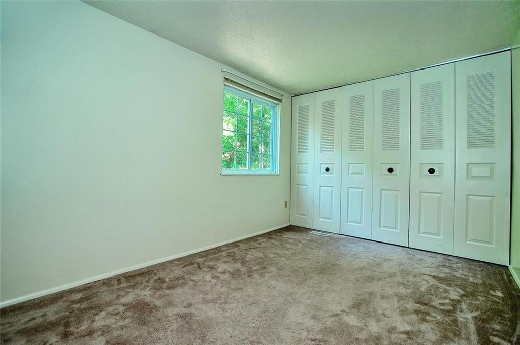 320 Sugar Maple Circle Washington, PA 15301 - Photo 11 of 23 a view of an empty room with window and closet area