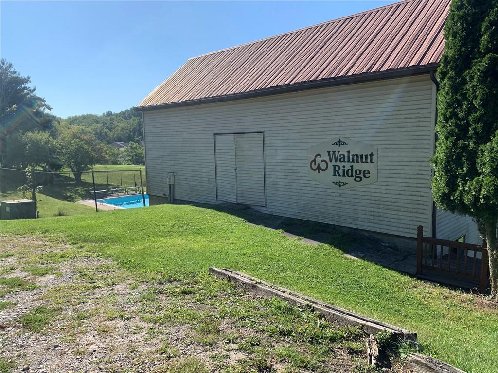 320 Sugar Maple Circle Washington, PA 15301 - Photo 19 of 23 a front view of a house with garden