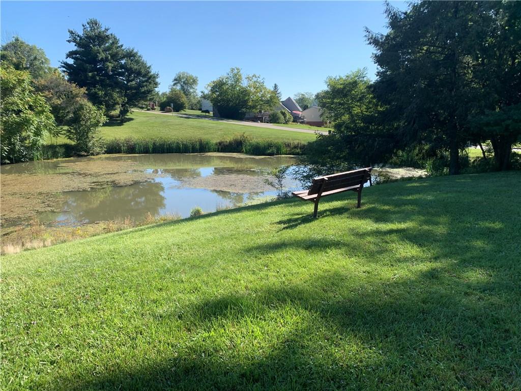 320 Sugar Maple Circle Washington, PA 15301 - Photo 20 of 23 a view of a park with a bench and trees