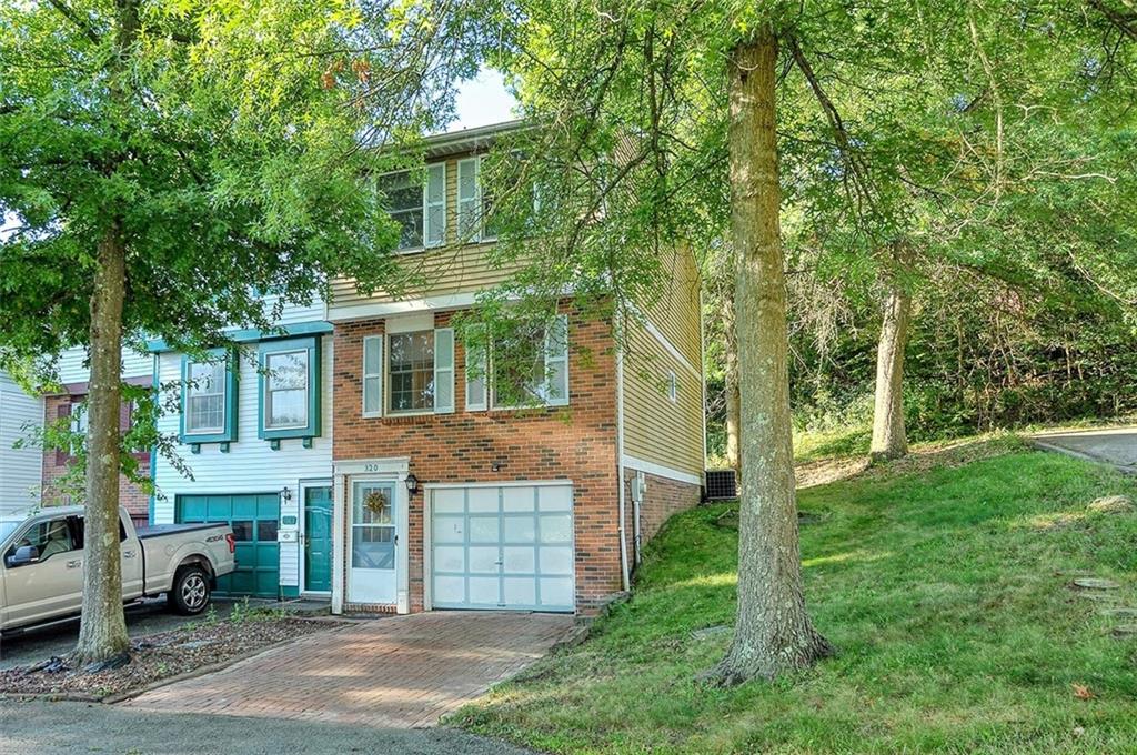 320 Sugar Maple Circle Washington, PA 15301 - Photo 2 of 23 front view of a house with a yard
