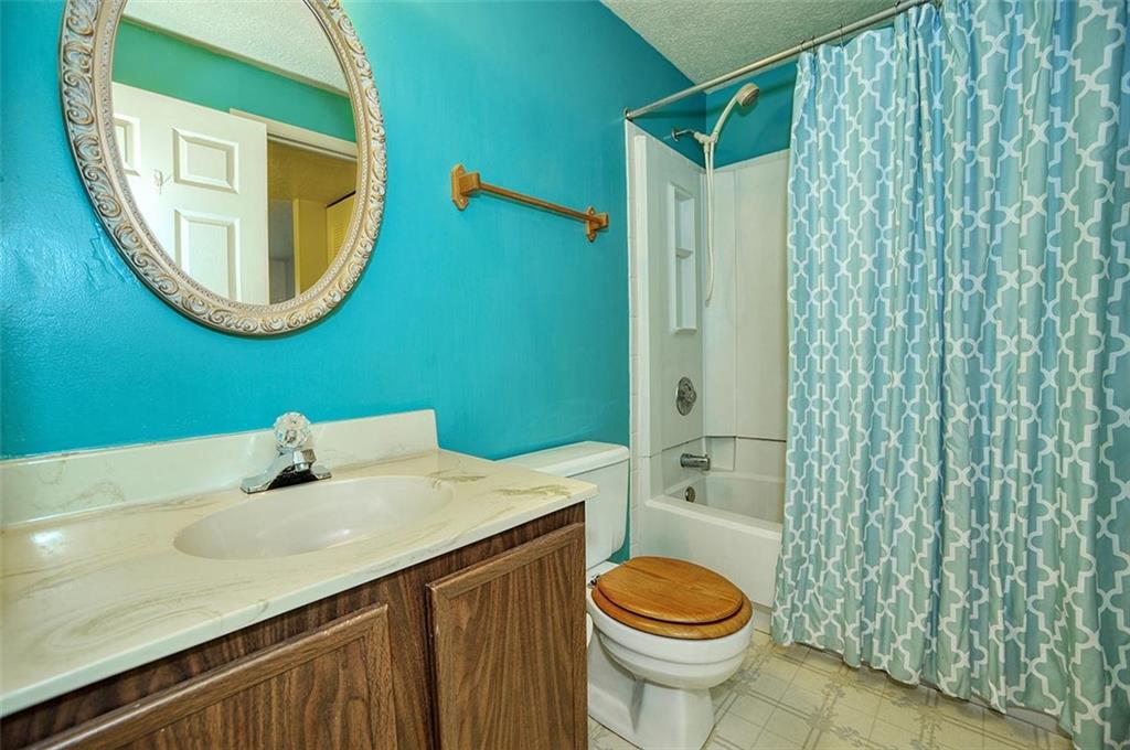 320 Sugar Maple Circle Washington, PA 15301 - Photo 9 of 23 a bathroom with a sink a toilet and a mirror