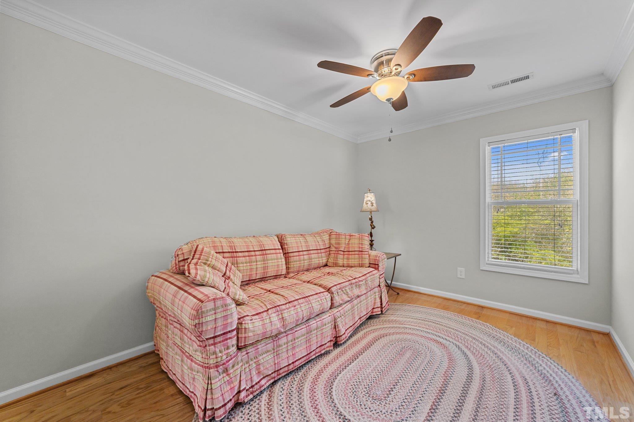 4728 Altha Street Raleigh, NC 27606 - Photo 17 of 31 a living room with furniture and a window