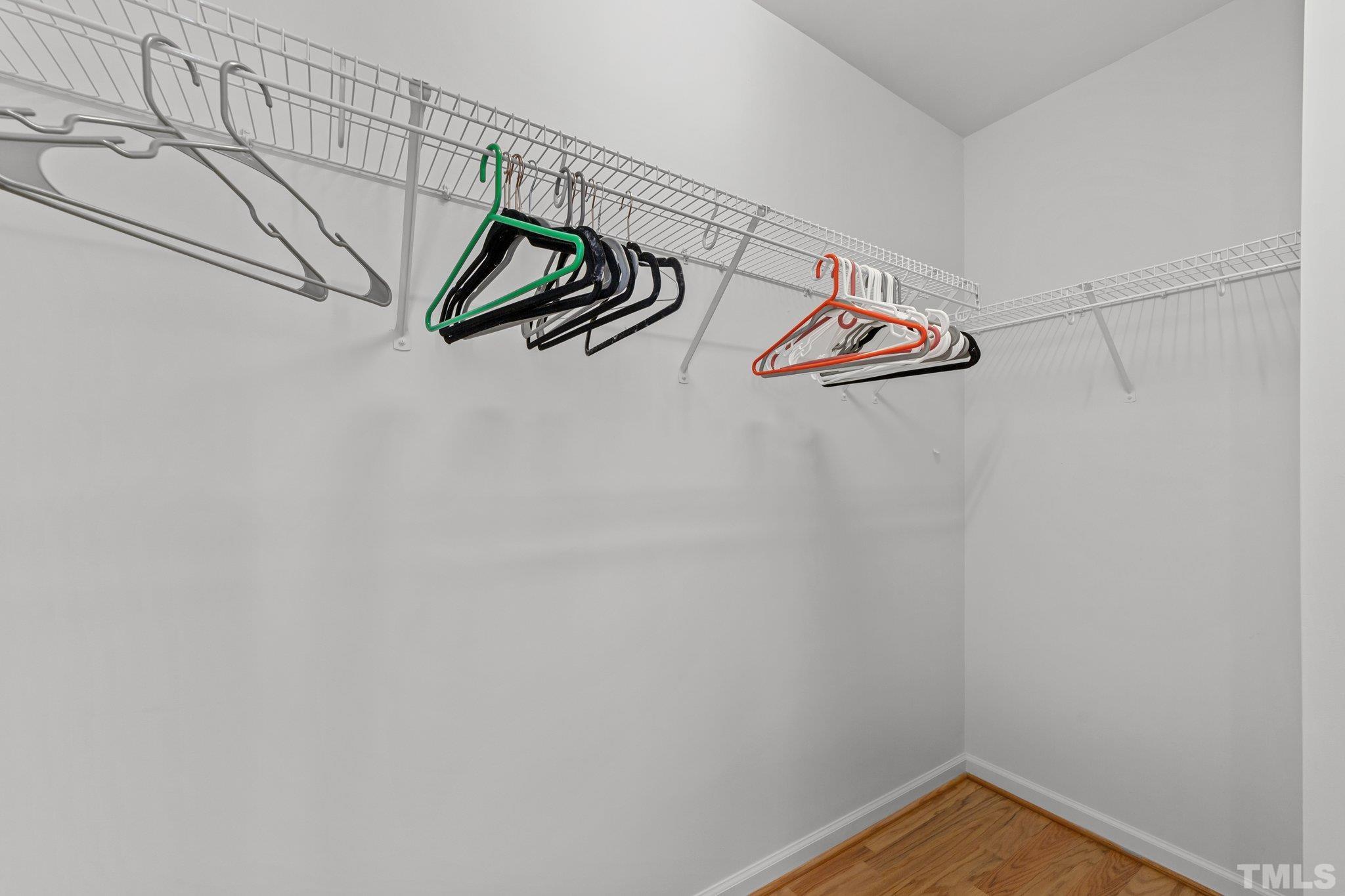 4728 Altha Street Raleigh, NC 27606 - Photo 27 of 31 a view of a room with racks on the wall