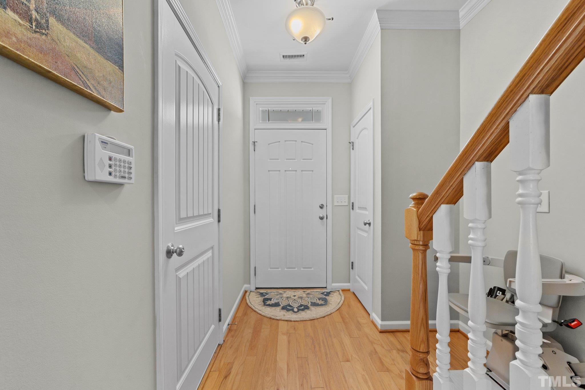 4728 Altha Street Raleigh, NC 27606 - Photo 4 of 31 a view of room with window and wooden floor